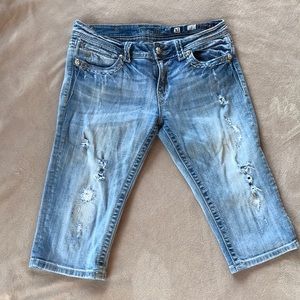 Light colored, distressed Miss Me Capris. Size 31